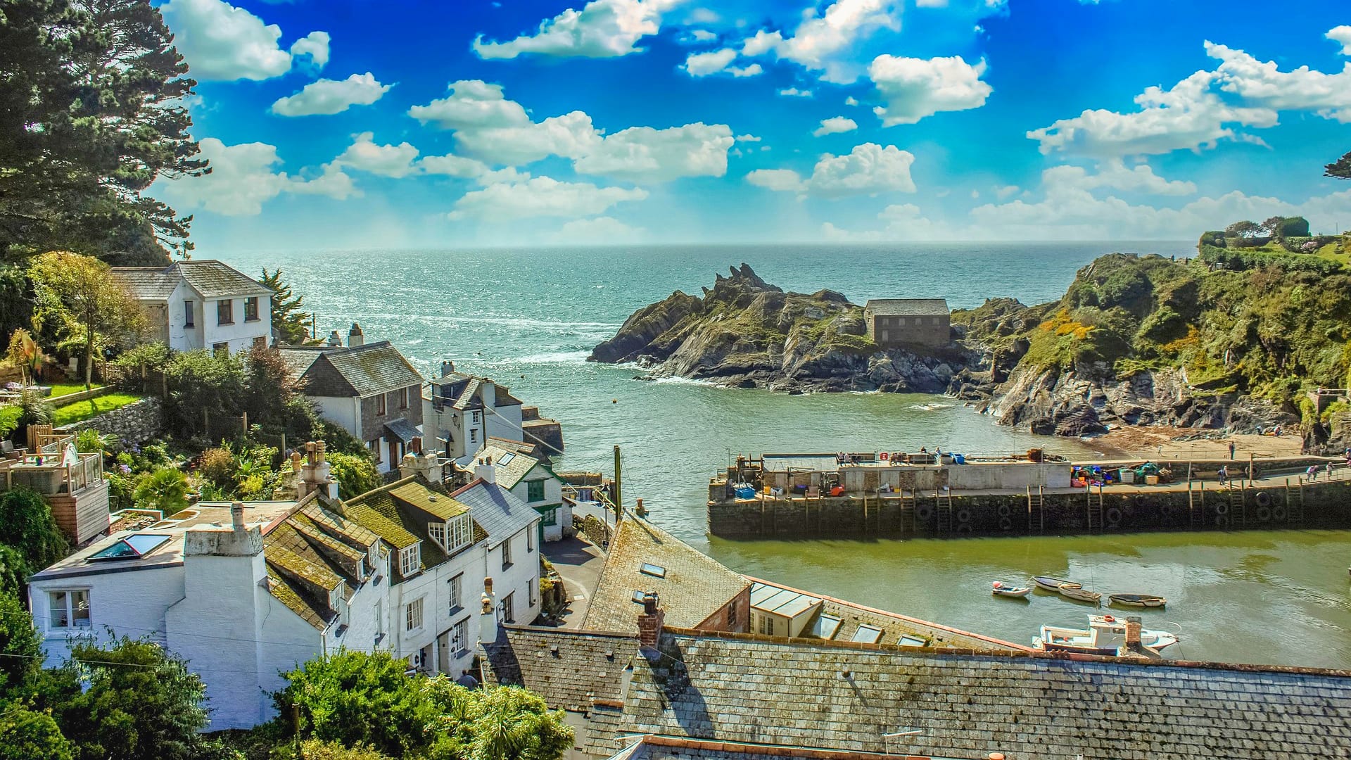 View of Cornish seaside town and beach showing places to stay in Cornwall